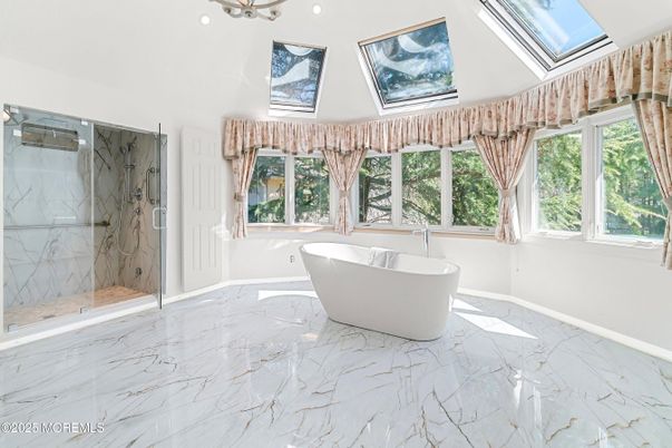 Bathroom, Free Standing Baths, Glass Shower, Interior, Marble, Marble Walls, Recessed Lighting