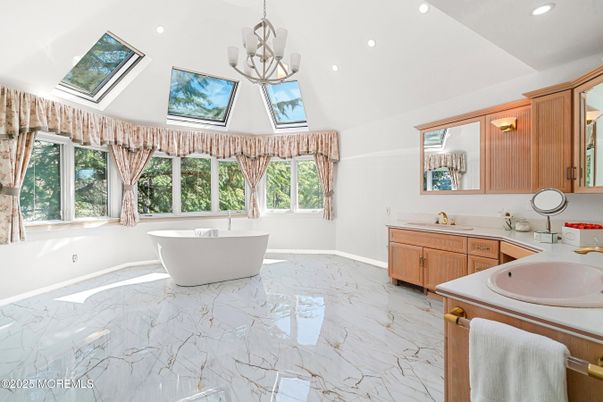Bathroom, Chandelier, Dual Sink Vanities, Free Standing Baths, Interior, Marble, Recessed Lighting