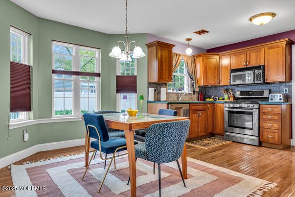 Dining room, Interior, Kitchen, Pendant Lights, Stainless Steel Appliances, Wood Texture Flooring