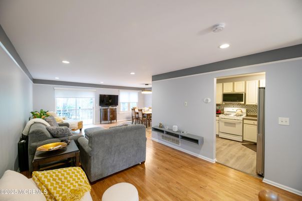 Dining room, Interior, Kitchen, Living room, Recessed Lighting, Stainless Steel Appliances, Wood Texture Flooring