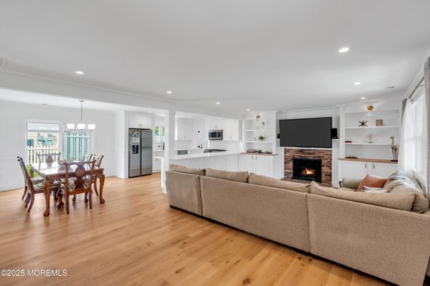 Dining room, Fireplace, Interior, Kitchen, Living room, Pendant Lights, Recessed Lighting, Wood Texture Flooring