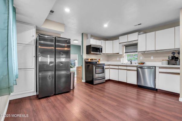 Interior, Kitchen, Recessed Lighting, Stainless Steel Appliances, Wood Texture Flooring