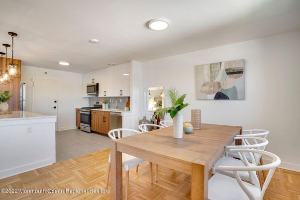 Dining room, Interior, Kitchen, Pendant Lights, Recessed Lighting, Stainless Steel Appliances, Wood Texture Flooring
