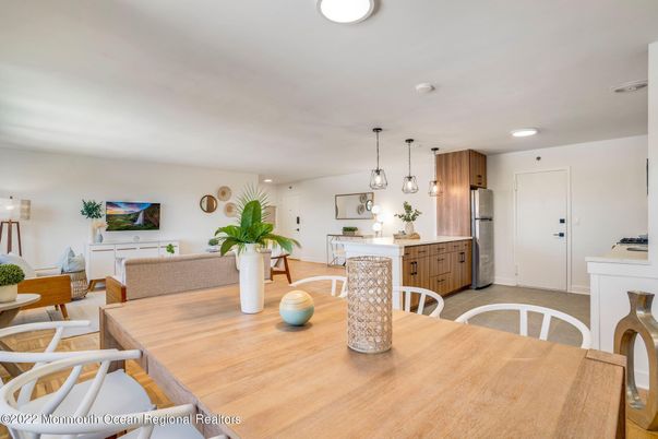 Dining room, Interior, Kitchen, Pendant Lights, Recessed Lighting, Stainless Steel Appliances, Wood Texture Flooring