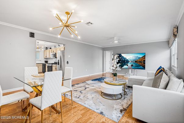 Dining room, Interior, Kitchen, Living room, Pendant Lights, Stainless Steel Appliances, Wood Texture Flooring