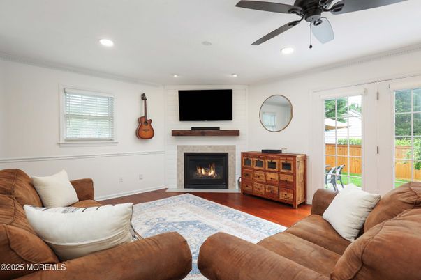 Fireplace, Interior, Living room, Recessed Lighting, Wood Texture Flooring