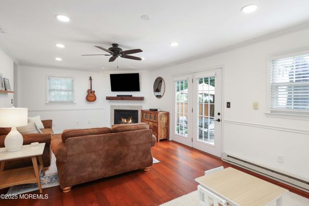 Fireplace, Interior, Living room, Recessed Lighting, Wood Texture Flooring