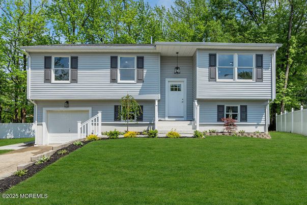 Attached, Exterior, Facade, Raised Ranch
