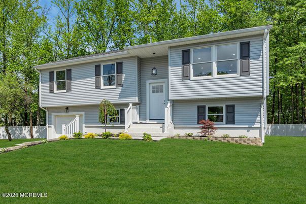 Attached, Exterior, Facade, Raised Ranch