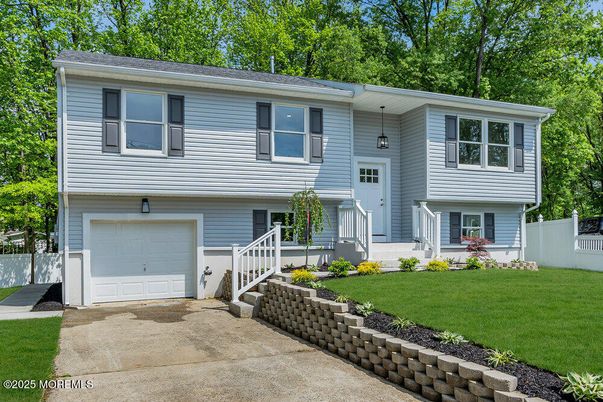 Attached, Exterior, Facade, Raised Ranch