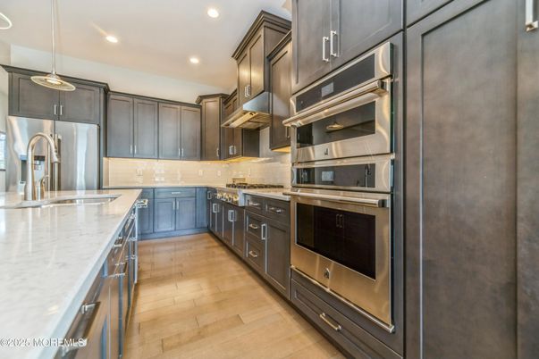 Interior, Kitchen, Pendant Lights, Recessed Lighting, Stainless Steel Appliances, Wood Texture Flooring