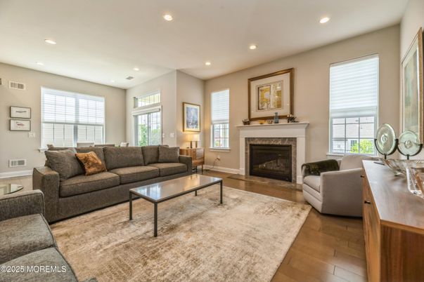 Fireplace, Interior, Living room, Recessed Lighting, Wood Texture Flooring