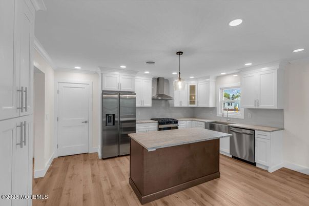 Interior, Kitchen, Pendant Lights, Recessed Lighting, Stainless Steel Appliances, Wood Texture Flooring