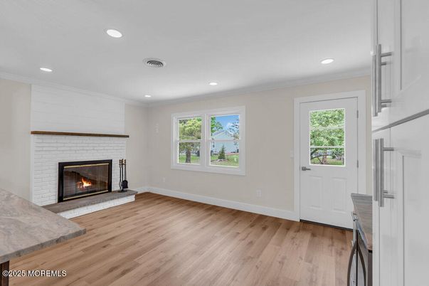 Empty room, Fireplace, Interior, Recessed Lighting, Wood Texture Flooring