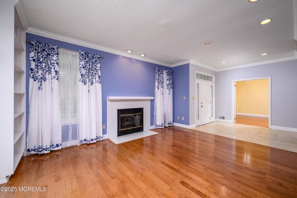 Empty room, Fireplace, Interior, Recessed Lighting, Wood Texture Flooring