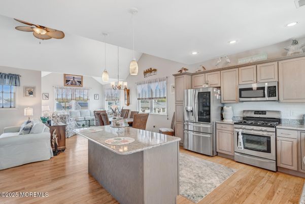 Dining room, Interior, Kitchen, Living room, Pendant Lights, Recessed Lighting, Stainless Steel Appliances, Wood Texture Flooring