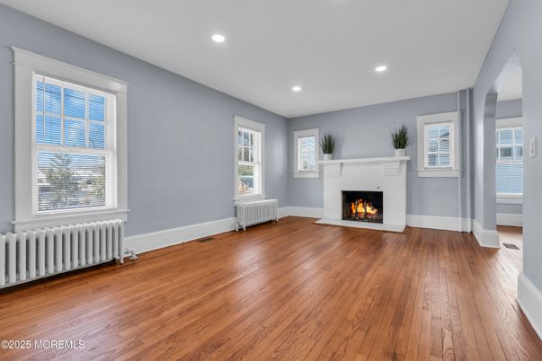Empty room, Fireplace, Interior, Recessed Lighting, Wood Texture Flooring