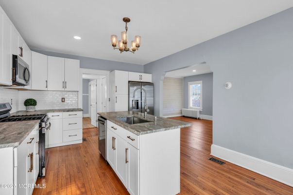 Chandelier, Interior, Kitchen, Recessed Lighting, Stainless Steel Appliances, Wood Texture Flooring