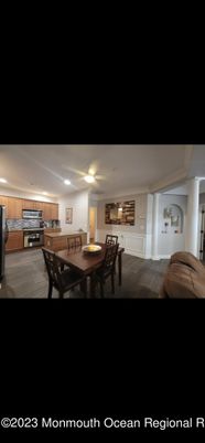 Dining room, Interior, Kitchen, Recessed Lighting, Stainless Steel Appliances, Wood Texture Flooring