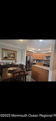 Dining room, Interior, Kitchen, Recessed Lighting, Stainless Steel Appliances, Wood Texture Flooring