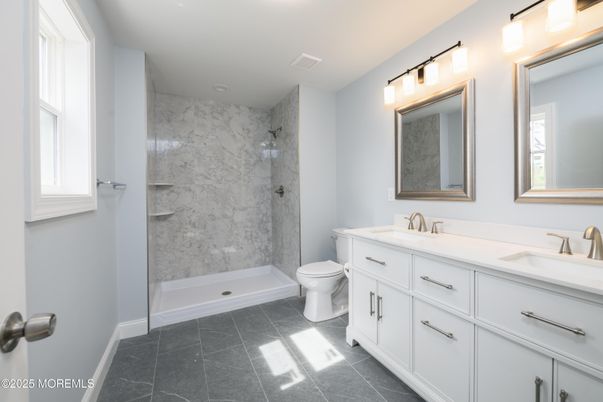 Bathroom, Dual Sink Vanities, Glass Shower, Interior, Marble Walls
