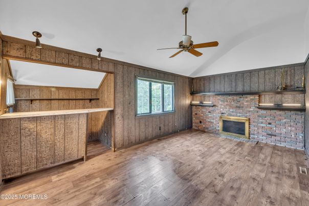 Empty room, Fireplace, Interior, Stone Walls, Wood Texture Flooring