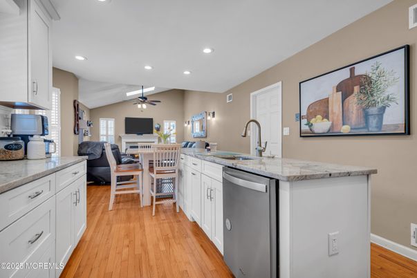Dining room, Interior, Kitchen, Recessed Lighting, Stainless Steel Appliances, Wood Texture Flooring