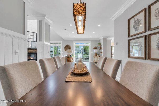Dining room, Fireplace, Interior, Pendant Lights, Recessed Lighting, Wood Texture Flooring