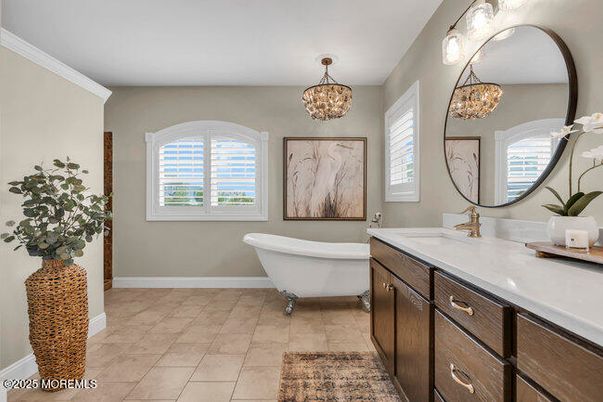 Bathroom, Chandelier, Dual Sink Vanities, Free Standing Baths, Interior, Pendant Lights