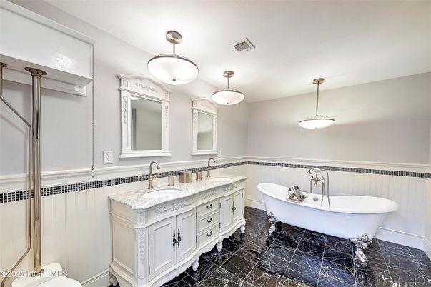 Bathroom, Dual Sink Vanities, Free Standing Baths, Interior, Marble, Pendant Lights