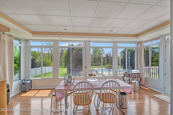 Dining room, Interior, Recessed Lighting, Sun Room, Wood Texture Flooring