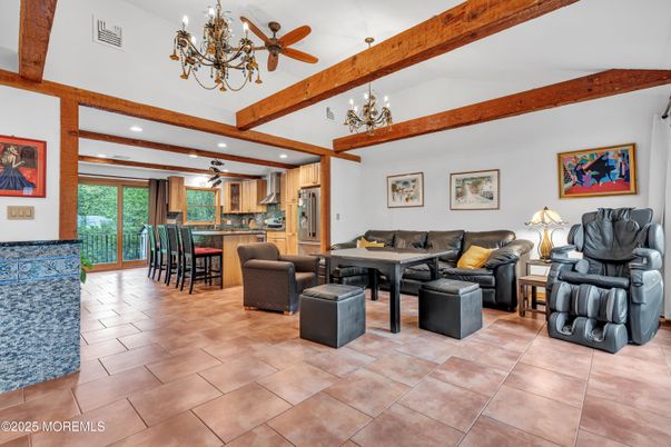 Chandelier, Dining room, Interior, Kitchen, Living room, Recessed Lighting, Stainless Steel Appliances, Wooden Beams