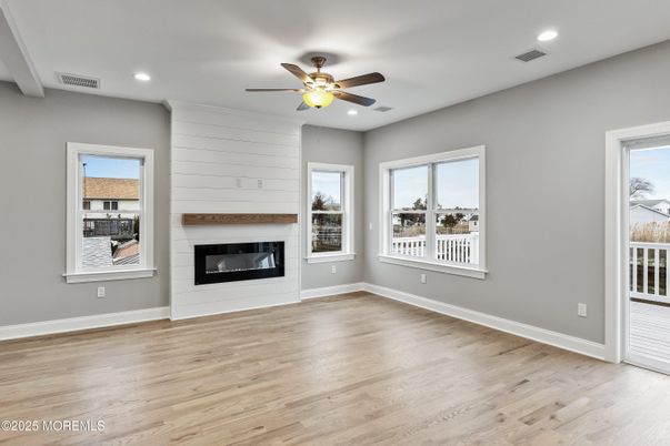 Empty room, Fireplace, Interior, Recessed Lighting, Wood Texture Flooring
