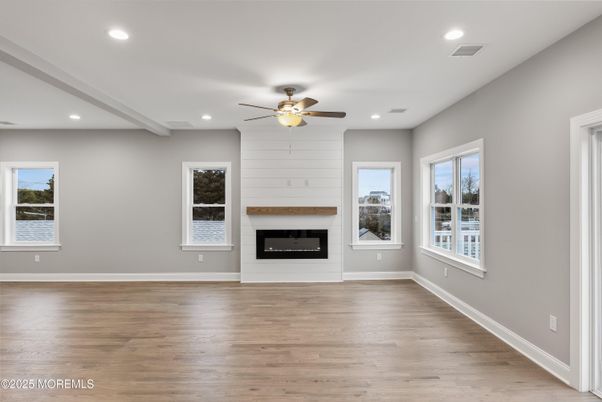 Empty room, Fireplace, Interior, Recessed Lighting, Wood Texture Flooring