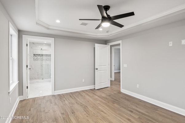 Bathroom, Empty room, Glass Shower, Interior, Recessed Lighting, Wood Texture Flooring