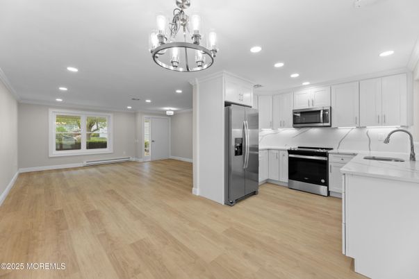 Chandelier, Interior, Kitchen, Recessed Lighting, Stainless Steel Appliances, Wood Texture Flooring