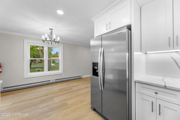 Chandelier, Interior, Kitchen, Recessed Lighting, Stainless Steel Appliances, Wood Texture Flooring