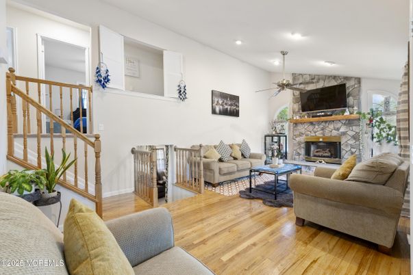 Fireplace, Interior, Living room, Recessed Lighting, Wood Texture Flooring