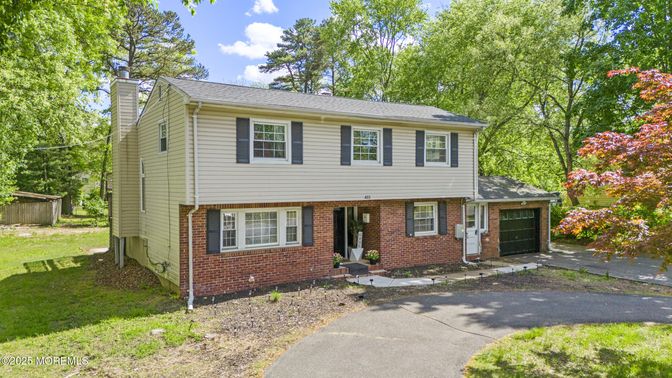 Attached, Exterior, Facade, Brick Facade, Raised Ranch