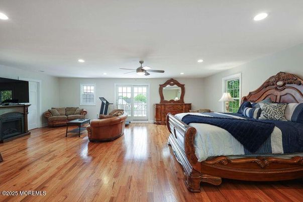 Bedroom, Fireplace, Interior, Recessed Lighting, Wood Texture Flooring
