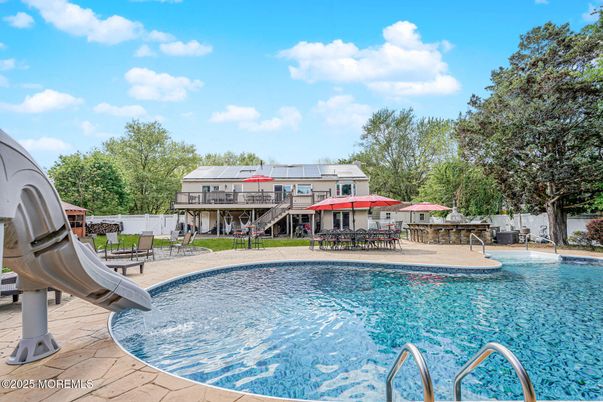 Exterior, Pool, Solar Panels