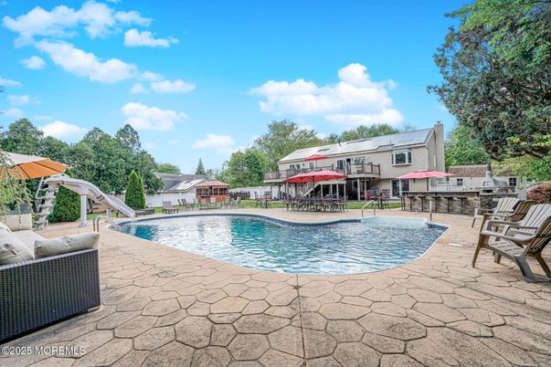 Exterior, Pool, Solar Panels