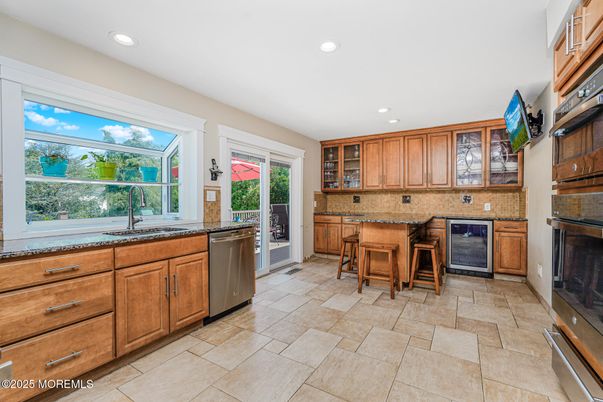 Fireplace, Interior, Kitchen, Recessed Lighting, Stainless Steel Appliances