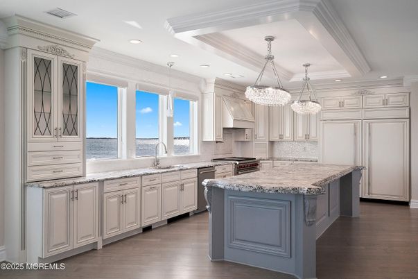 Chandelier, Interior, Kitchen, Pendant Lights, Recessed Lighting, Stainless Steel Appliances, Wood Texture Flooring