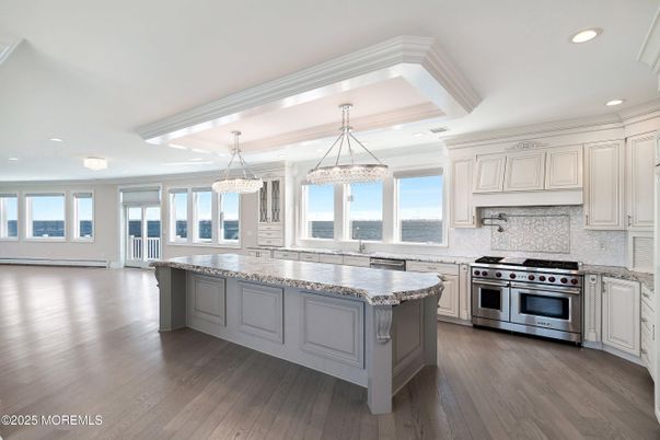 Chandelier, Interior, Kitchen, Recessed Lighting, Stainless Steel Appliances, Wood Texture Flooring