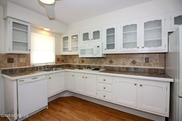 Interior, Kitchen, Tile Countertops, Wood Texture Flooring