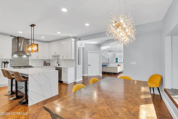 Chandelier, Interior, Kitchen, Pendant Lights, Recessed Lighting, Stainless Steel Appliances, Wood Texture Flooring