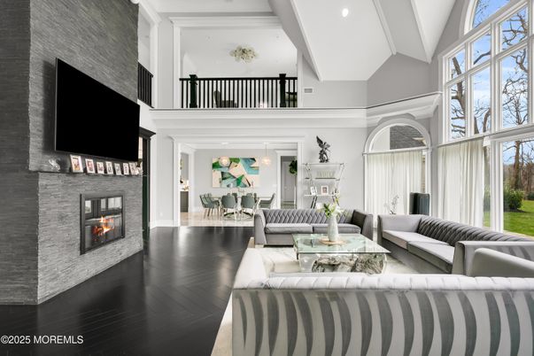 Dining room, Fireplace, Interior, Living room, Recessed Lighting, Wood Texture Flooring
