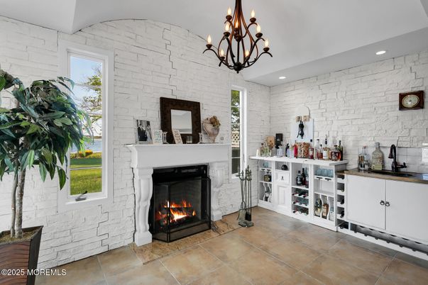 Chandelier, Fireplace, Interior, Recessed Lighting, Stone Walls