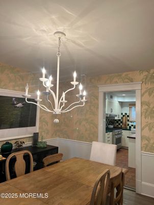 Chandelier, Dining room, Interior, Kitchen, Stainless Steel Appliances, Wood Texture Flooring